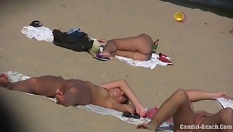 Hidden Camera Captures Passionate Couples At Nudist Beach